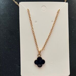 Elegant Gold and Black Clover Pendant Necklace